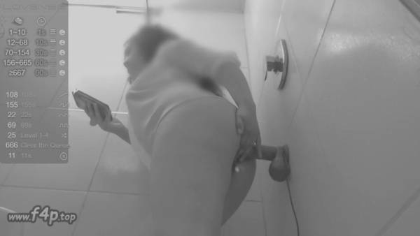 Curvy dark-skinned woman trains deep anal stretching in black and white bathroom selfie on adultfans.net
