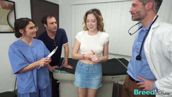 Young blonde patient bred during a medical exam by doctor and nurse on adultfans.net