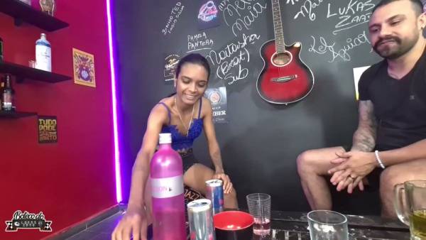 Skinny brunette with natural tits seduces tattooed man in a neon-lit casting session on adultfans.net