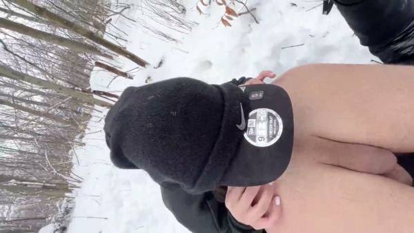 Young woman and man engage in deep rimming and oral sex in a snowy forest on adultfans.net