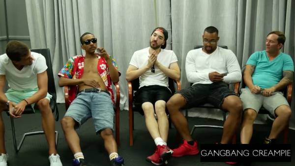 Dark-haired beauty faces multiple men in intense casting session turned gangbang on adultfans.net