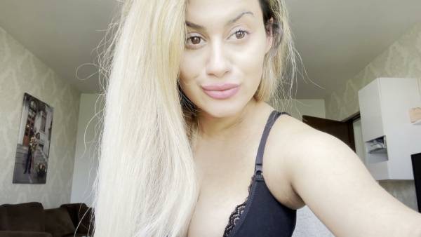 Blonde Romanian porn star pleasures herself on camera in her modern living room - Romania on adultfans.net