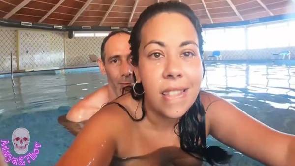Voluptuous brunette MILF caught in steamy indoor pool encounter with multiple lovers on adultfans.net