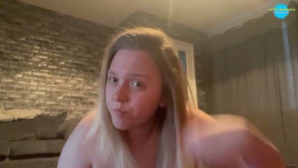 Young blonde solo star teases bare breasts in warm brick-lit room on adultfans.net