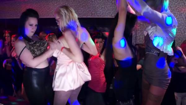 Young adults let loose in a neon-lit club during an impromptu group encounter on adultfans.net