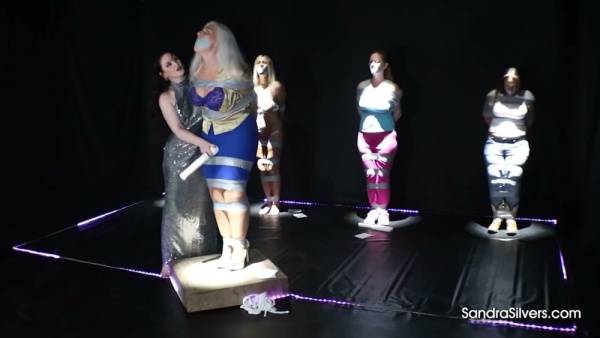 Chubby contestant faces femdom discipline on a kinky gameshow stage on adultfans.net