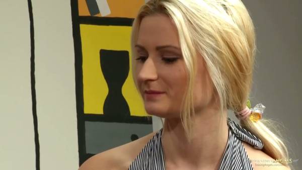 Blonde locks tangled in the cushions as the couple sinks into the couch on adultfans.net
