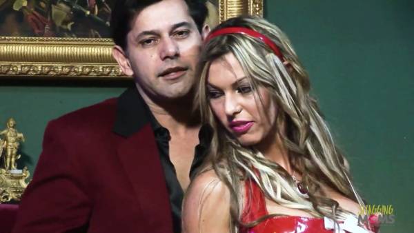 Voluptuous blonde in red lingerie rides and submits for her dark-haired lover in a gothic chamber on adultfans.net