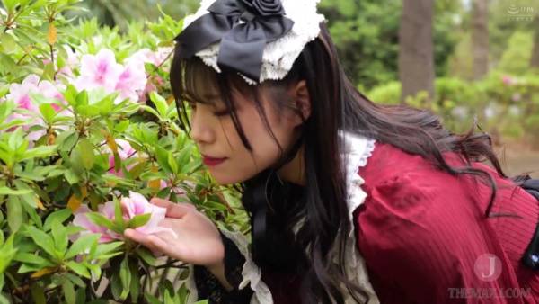 Young Japanese woman in red dress shares intimate kiss with older man - Japan on adultfans.net