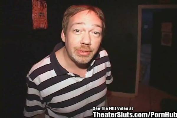Interracial gang bang with ebony performers in a dimly lit dungeon on adultfans.net