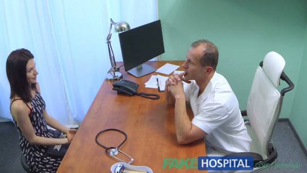 European doctor in white coat treats his patient with oral care on the exam table on adultfans.net