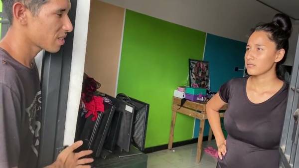 Dark-haired young woman meets Asian man by a car before moving indoors for passionate intimacy - Venezuela on adultfans.net