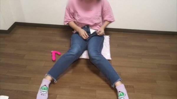 Alone on a pink pillow, a figure explores pleasure with a bright pink dildo - Japan on adultfans.net