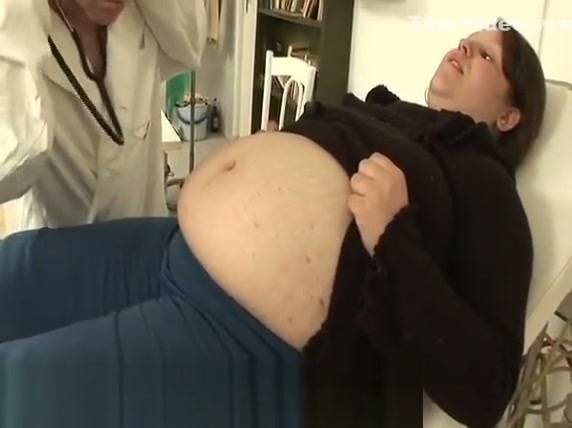 Pregnant brunette and doctor turn a routine check-up into a passionate intimate session on adultfans.net