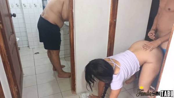Blonde with huge tits gets oral from one man while another watches in a tiled bathroom on adultfans.net