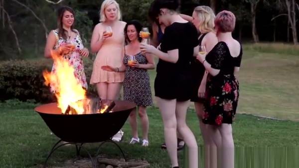 Australian lesbians get intimate around a campfire in the woods - Australia on adultfans.net