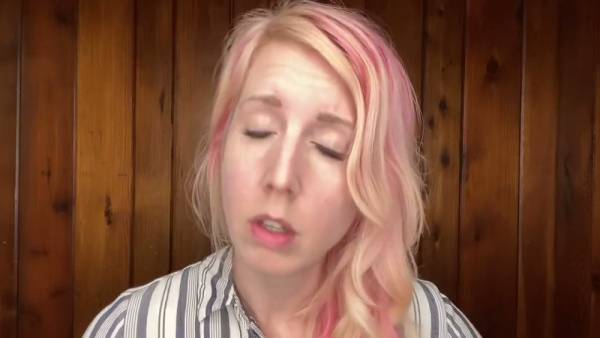 Pink-haired tattooed amateur reveals her pierced pussy on camera on adultfans.net