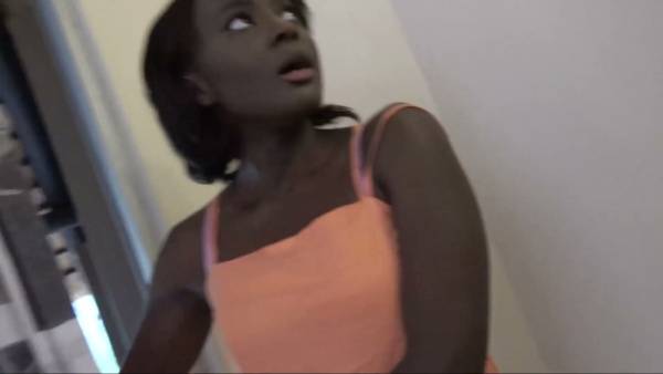 Dark-skinned African woman bares all in outdoor and intimate bedroom scenes on adultfans.net