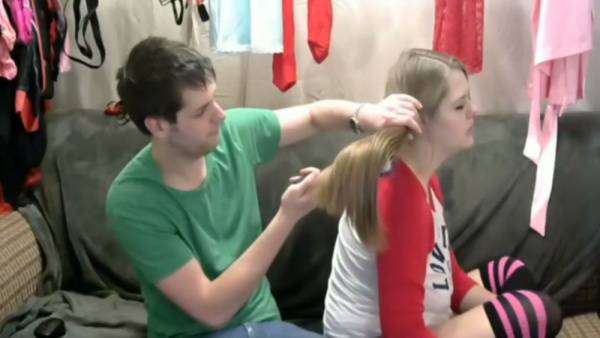 Young blonde lets him pull her long hair during an intimate webcam moment on adultfans.net