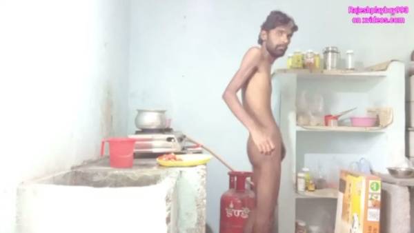 Skinny dark-skinned man jerks off and fingers his ass while cooking in a messy kitchen on adultfans.net