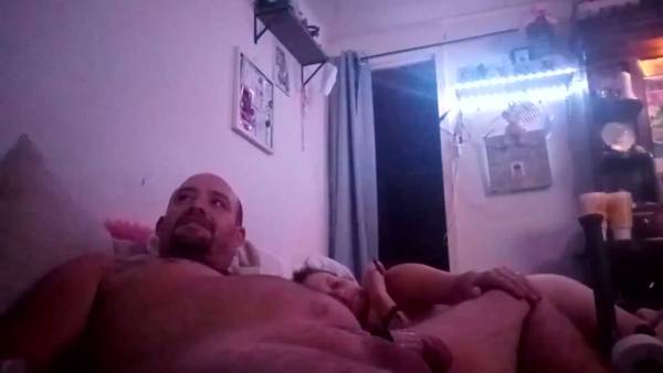 Bald bearded man tied up and lightly whipped during a toy-filled BDSM session on adultfans.net