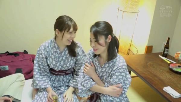 Two elegant Japanese women share an intimate moment with a man after a traditional gathering - Japan on adultfans.net