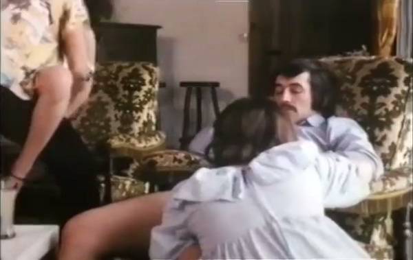 Vintage lounge setting hosts a series of passionate encounters between couples and threesomes on adultfans.net