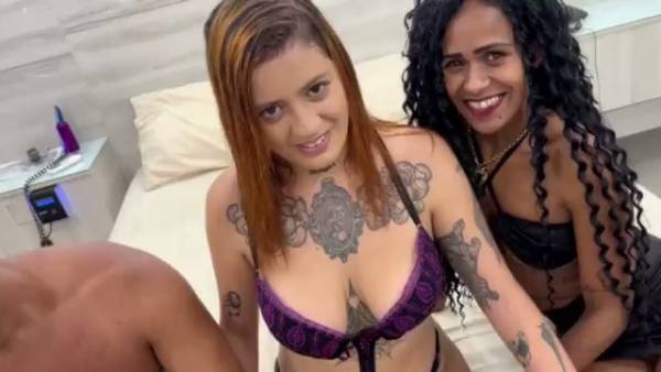 Latina and tattooed blonde share a muscular lover in intense interracial threesome on adultfans.net