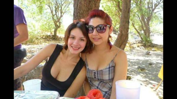 Chilean woman poses seductively with large breasts and full hips in intimate settings - Chile on adultfans.net