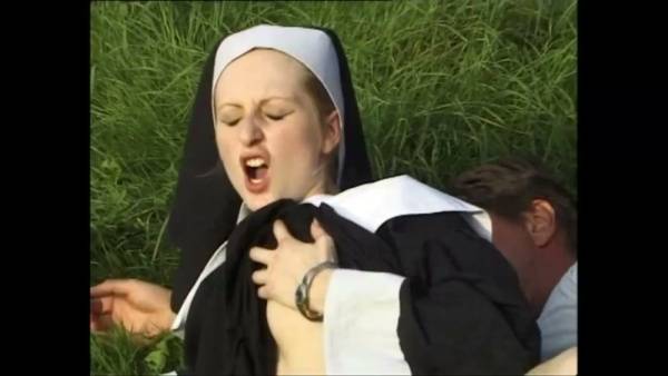 Blonde nun in woods takes cock deep in mouth and rides hard on open grass on adultfans.net