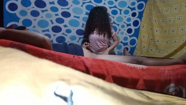 Hidden camera captures intimate moment between two lovers in a colorful bedroom - Mexico on adultfans.net