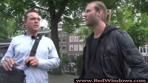 Two men share intimate moments in a Dutch cityscape - Netherlands on adultfans.net