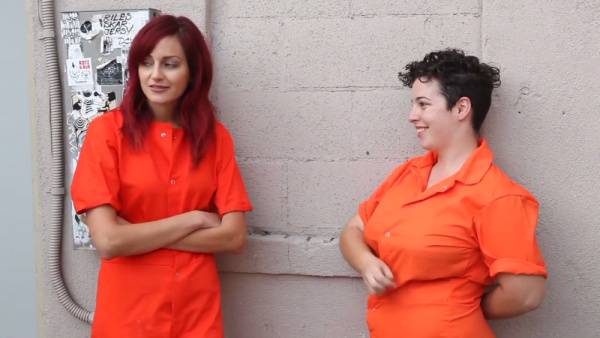 Redheaded prisoner gets spanked and pleasured by a lesbian guard in steamy prison cosplay on adultfans.net