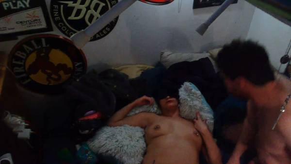 Black-haired beauty and bearded man heat up in a dim bedroom on adultfans.net