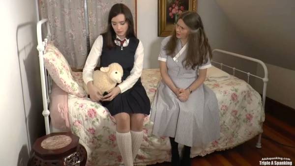 Young woman in pinafore spanked and diapered in playful mommy roleplay on adultfans.net