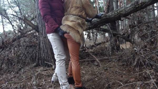 Blonde in fur and leather spreads bare in winter forest during risky outdoor encounter on adultfans.net