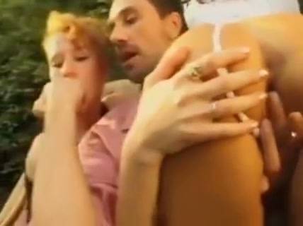 Mature blonde takes anal from her partner while two women join in the garden on adultfans.net
