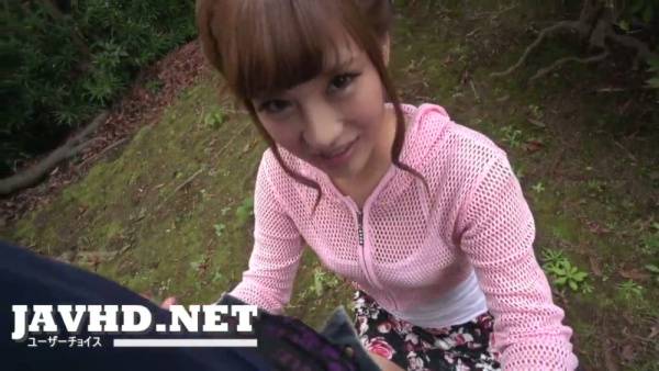 Asian MILF dominates outdoors with teasing handjob on mossy ground - Japan on adultfans.net