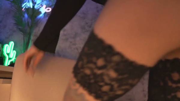 Tattooed woman with bold facial ink intensifies her solo session with a black vibrator on adultfans.net