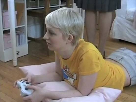 Blonde gamer humiliated by dominant woman who exposes her on camera on adultfans.net