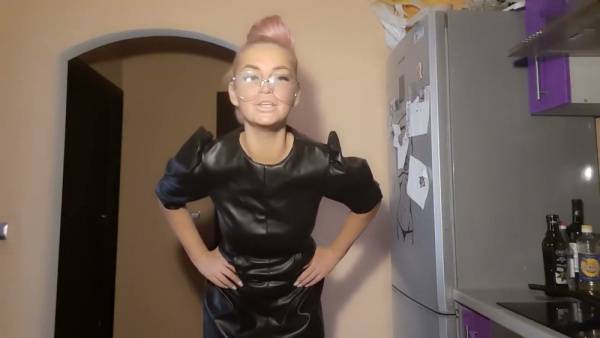 Latex-clad dominatrix trains her sissy in strapon techniques and cum swallowing on adultfans.net
