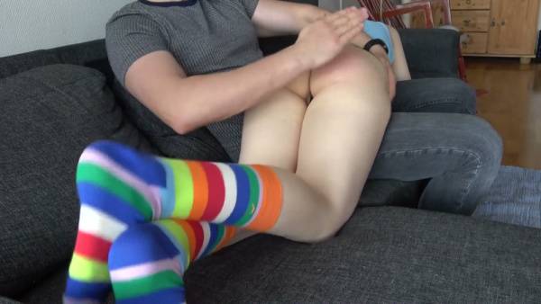 Disciplinary spanking session unfolds across home settings with firm correction on adultfans.net