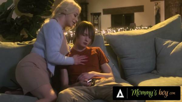 Blonde MILF stepmom rides young muscular stepson in forbidden living room encounter on adultfans.net