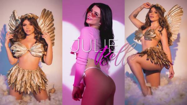 Yuli Belle teases in feathers then shifts to black leather for a passionate solo dance on adultfans.net