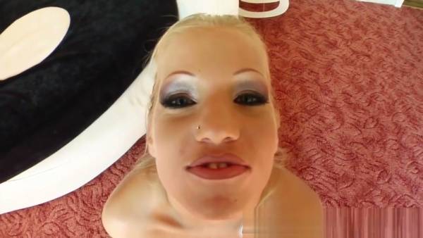 Blonde with tattoo takes on two men in rooftop threesome ending in double cumshot on adultfans.net