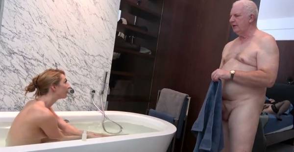 Mature amateur group shares intimate moments in bedroom and bathroom on adultfans.net