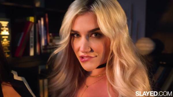 Blonde Skye and her dark-haired lover entwine in passionate lesbian acts across velvet and library on adultfans.net