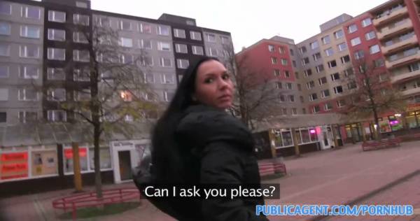 Dark-haired woman takes stranger's cock and feet in a gritty public parking garage on adultfans.net