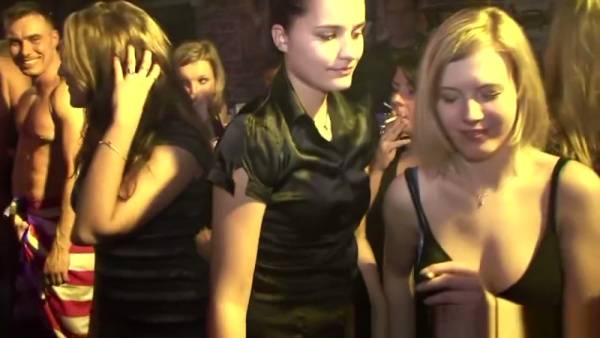 Young crowd in a nightclub spills into wild group sex against the walls on adultfans.net