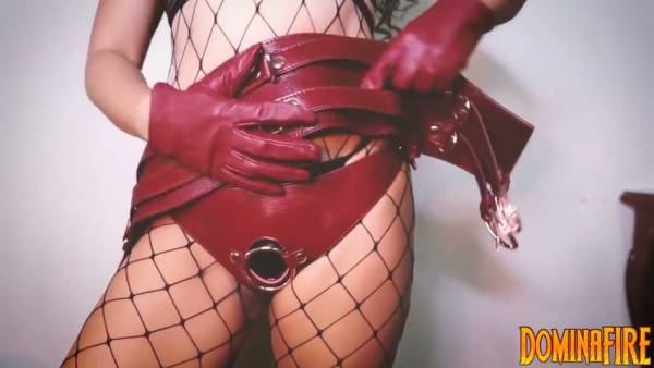 Confident dominatrix in red leather gloves unveils strapon and flogger from liebeseele - Germany on adultfans.net